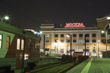 Train on Moscow passenger platform (Savelovsky railway station) is one of the nine main railway stations in Moscow, Russia (at night)のeditorial素材