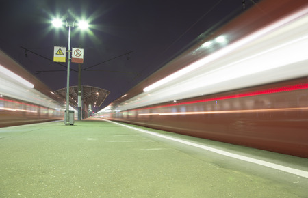 Train on Moscow passenger platform (Savelovsky railway station) is one of the nine main railway stations in Moscow, Russia (at night)のeditorial素材
