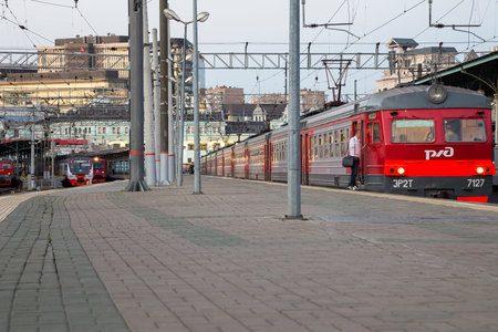 Train on Moscow passenger platform at night (Belorussky railway station) -- is one of the nine main...