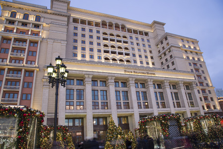 Christmas and New Year holidays illumination and Four Seasons Hotel Moscow at night. Russia. Moscow seasons-inscription in Russianのeditorial素材