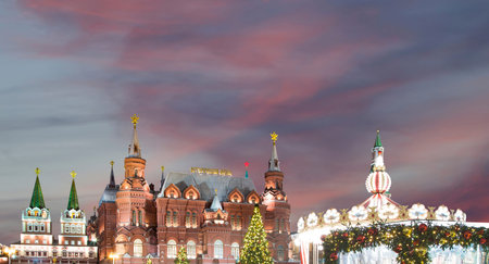 Christmas (New Year holidays) illumination and State Historical Museum (inscription in Russian) at...