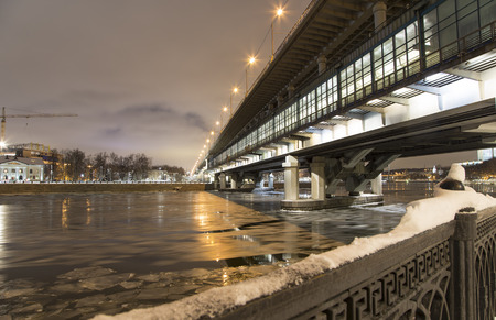 Moskva River, Luzhnetskaya Bridge (Metro Bridge) on a winter evening. Moscow, Russia  のeditorial素材