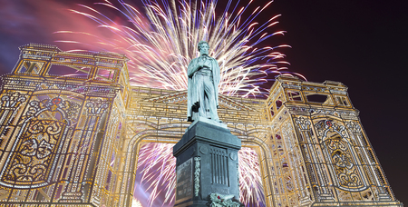 Fireworks over the Moscow city center and a monument to Pushkin on Tverskaya Street at night, Russia     の写真素材