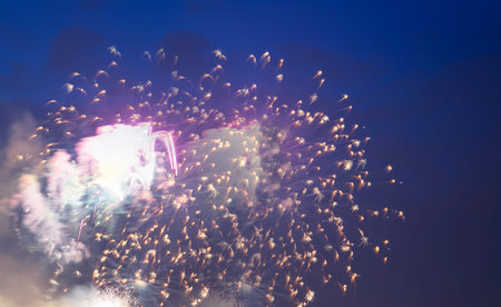 Celebratory colorful fireworks exploding in the skies.