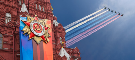 Historical museum (Victory Day decoration) and Russian military aircrafts fly in formation, Red Square, Moscow, Russiaのeditorial素材