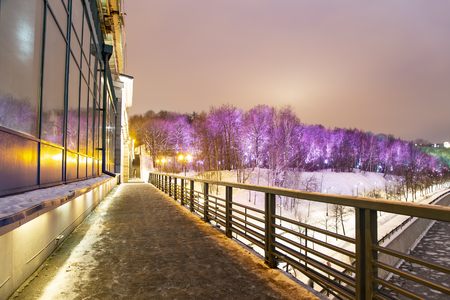 Christmas (New Year holidays) decoration in Moscow (at night), Russia-- Vorobyovskaya Embankment of the Moskva river and Sparrow Hills (Vorobyovy Gory)の写真素材