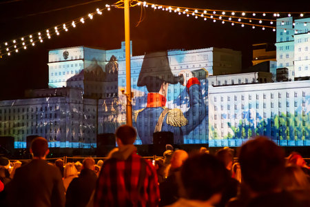 International Festival Circle of Light. Laser video mapping show on facade of the Ministry of...