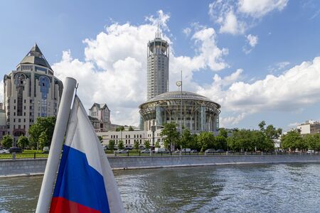 Concert hall House of Music on the banks of the Moscow river. Moscow, Russia.  Shooting from a tourist pleasure boatの写真素材