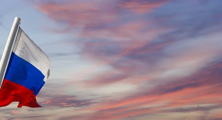 Russia flag waving in the wind against the sky. Three colors of Russian wavy flag as a patriotic symbolの写真素材