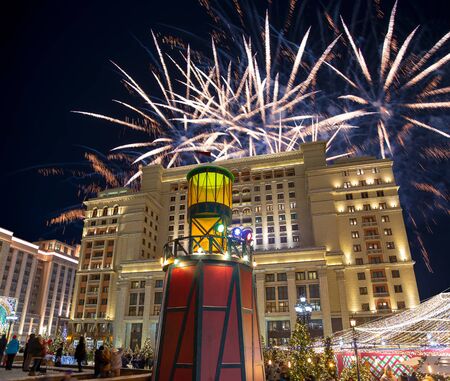 Fireworks over the Christmas and New Year holidays illumination and Four Seasons Hotel Moscow at night. Russiaの写真素材