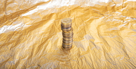 Iron 10 rubles coins (written ten rubles, the Bank of Russia in the Russian) on gold (yellow)...