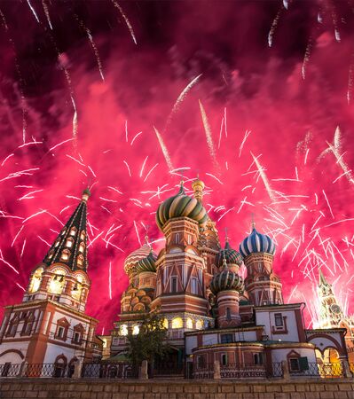 Cathedral of Intercession of Most Holy Theotokos on the Moat ( Temple of Basil the Blessed) and fireworks in honor of Victory Day celebration (WWII),  Red Square, Moscow, Russiaの写真素材