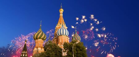 Cathedral of Intercession of Most Holy Theotokos on the Moat ( Temple of Basil the Blessed) and fireworks in honor of Victory Day celebration ,  Red Square, Moscow, Russia.の写真素材
