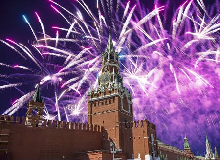 The Spasskaya Tower and fireworks in honor of Victory Day celebration (WWII),  Red Square, Moscow, Russia   の写真素材