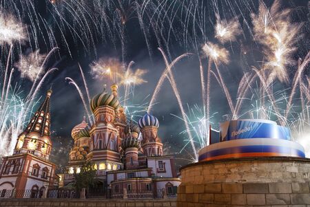 Temple of Basil the Blessed and fireworks in honor of Victory Day celebration (WWII), Moscow, Russia.English translation from Russian: Victory!の写真素材