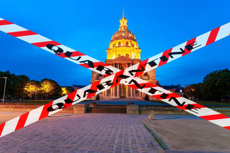 Coronavirus in Paris, France. Quarantine sign. Concept of COVID pandemic and travel in Europe.のeditorial素材