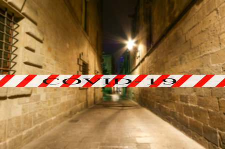 Coronavirus in Barcelona, Spain. Covid-19 sign on a blurred background. Concept of COVID pandemic...