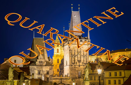 Coronavirus in Prague, Czech Republic. Mala Strana Bridge Tower at Charles Bridge. Quarantine sign....