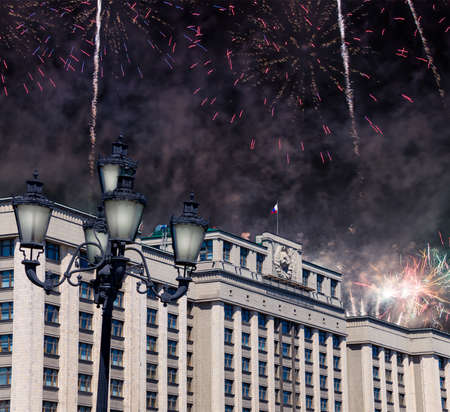 Fireworks over the building of The State Duma of the Federal Assembly of Russian Federation during Victory Day (WWII), Moscow, Russiaの写真素材
