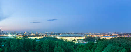 view of central Moscow from Sparrow Hills or Vorobyovy Gory observation (viewing) platform at sunset-- is on a steep bank 85 m above the Moskva river, or 200 m above sea level. Russiaの写真素材