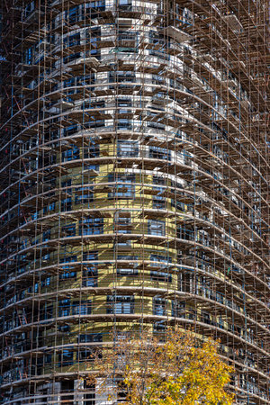 Multi-storey building under construction with scaffolding (new residential complex), Moscow, Russia
