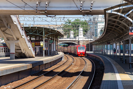 Train on Moscow passenger platform (Belorussky railway station) is one of the nine main railway...