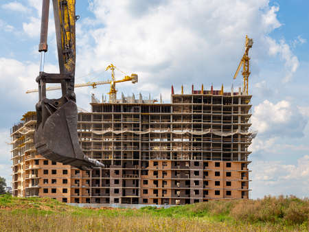 Part of a construction machine (excavator or crane) on the background construction site, industrial image. Moscow, Russiaの写真素材