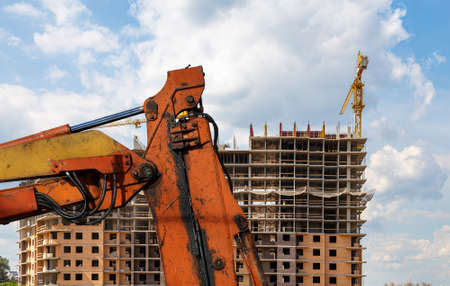 Part of a construction machine (excavator or crane) on the background construction site, industrial image. Moscow, Russiaの写真素材