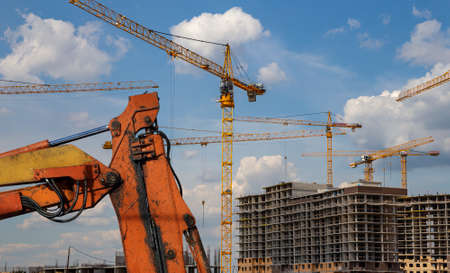 Part of a construction machine (excavator or crane) on the background construction site, industrial image. Moscow, Russiaのeditorial素材