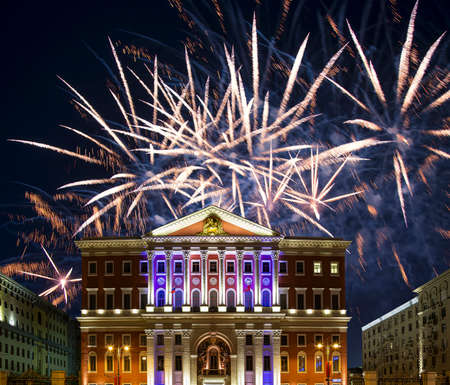 The building of the residence of the Mayor of Moscow with illumination at night, against the background of fireworks. Moscow, Russiaのeditorial素材