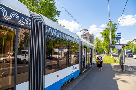 Modern tram (urban electric transport) on a Moscow street (central district), Russiaのeditorial素材