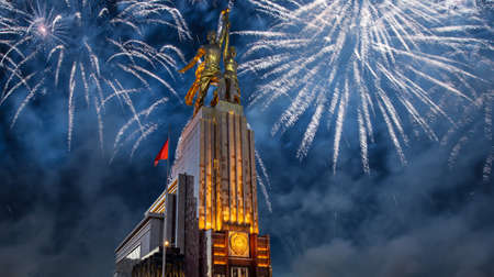 Celebratory colorful fireworks and soviet monument Rabochiy i Kolkhoznitsa (Worker and Kolkhoz Woman or Worker and Collective Farmer) of sculptor Vera Mukhina, Moscow, Russia. Made of in 1937のeditorial素材