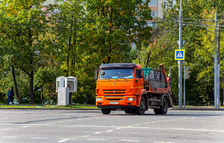 Truck rides on the street in city (summer sunny day). Moscow, Russiaのeditorial素材