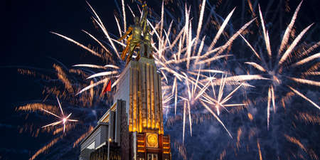 Celebratory colorful fireworks and soviet monument Rabochiy i Kolkhoznitsa (Worker and Kolkhoz Woman or Worker and Collective Farmer) of sculptor Vera Mukhina, Moscow, Russia. Made of in 1937のeditorial素材