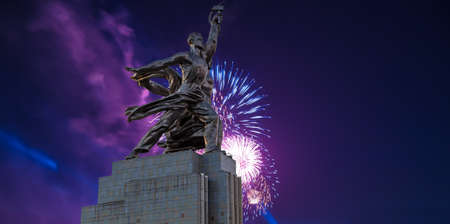 Celebratory colorful fireworks and soviet monument Rabochiy i Kolkhoznitsa (Worker and Kolkhoz Woman or Worker and Collective Farmer) of sculptor Vera Mukhina, Moscow, Russia. Made of in 1937のeditorial素材