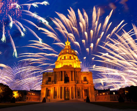 Celebratory colorful fireworks over the Les Invalides (The National Residence of the Invalids) at night. Paris, Franceの写真素材