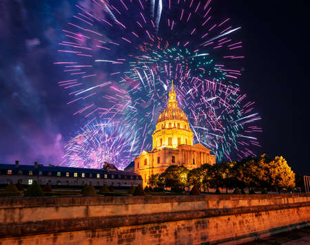 Celebratory colorful fireworks over the Les Invalides (The National Residence of the Invalids) at night. Paris, Franceの写真素材