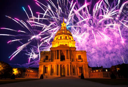 Celebratory colorful fireworks over the Les Invalides (The National Residence of the Invalids) at night. Paris, Franceの写真素材