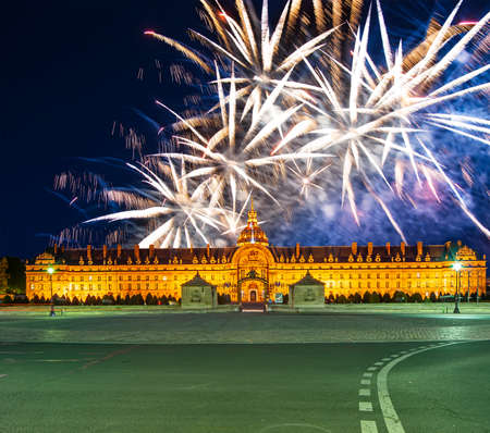 Celebratory colorful fireworks over the Les Invalides (The National Residence of the Invalids) at night. Paris, Franceの写真素材