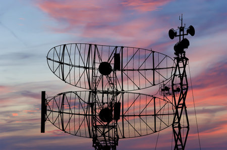 Air defense radars of military mobile anti aircraft systems, modern army industry on the background...