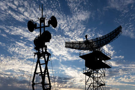 Air defense radars of military mobile anti aircraft systems, modern army industry on background beautiful clouds and sky, Russiaの写真素材
