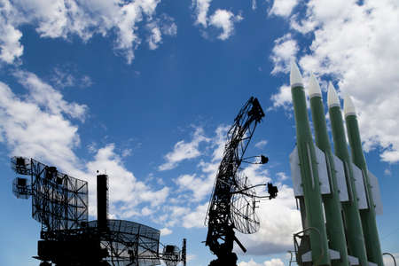 Air defense radars of military mobile anti aircraft systems and modern Russian anti aircraft missiles OSA-AKM on background clouds and sky,Russiaの写真素材