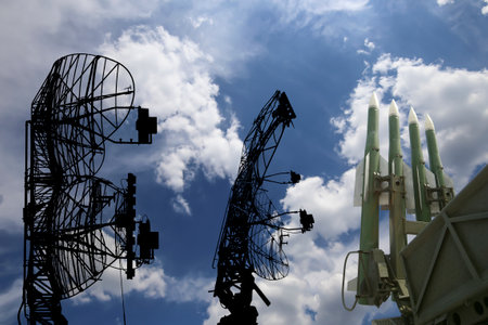 Air defense radars of military mobile anti aircraft systems and modern Russian anti aircraft missiles OSA-AKM on background clouds and sky,Russiaのeditorial素材