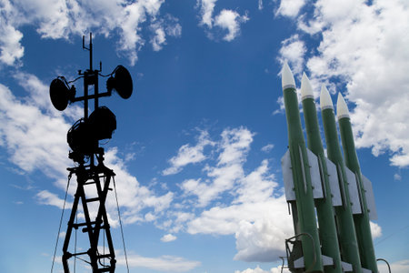 Air defense radars of military mobile anti aircraft systems and modern Russian anti aircraft missiles OSA-AKM on background clouds and sky,Russiaのeditorial素材