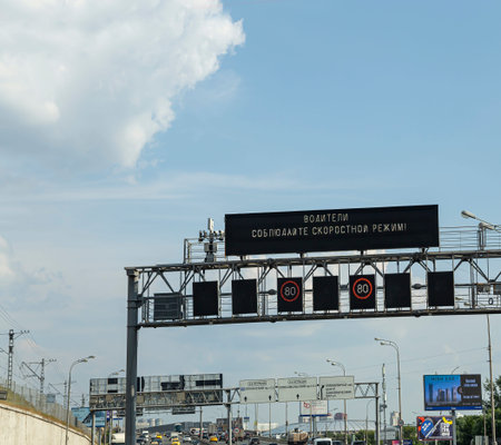 Information board with speed limit signs above expressway lanes. Moscow, Russia