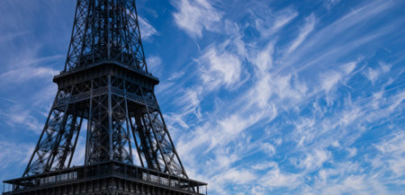 Eiffel Tower against the background of a beautiful sky with clouds. Paris, Franceの写真素材