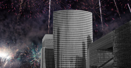 Celebratory fireworks over the Skyscrapers La Defense, commercial and business center of Paris,...