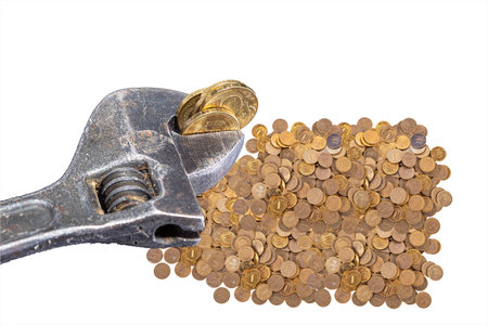 Allegory of the global financial crisis - Iron 10 rubles coin (written ten rubles, the Bank of Russia) in the grip of economic crisis, on a white background. Finance and business conceptの写真素材