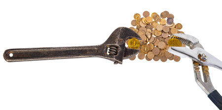 Allegory of the global financial crisis - Iron 10 rubles coin (written ten rubles, the Bank of Russia) in the grip of economic crisis, on a white background. Finance and business conceptの写真素材
