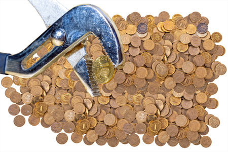 Allegory of the global financial crisis - Iron 10 rubles coin (written ten rubles, the Bank of Russia) in the grip of economic crisis, on a white background. Finance and business conceptの写真素材